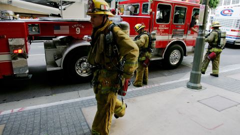 LOS ANGELES - SEPTEMBER 12: Firefighters respond to what turned out to be a false alarm at 660 Figueroa following a massive power outage that affected downtown September 12, 2005 in Los Angeles, California. Early reports suggested that a high-power line was inadvertantly cut. (Photo by Robert Laberge/Getty Images)