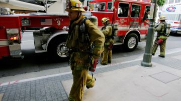 LOS ANGELES - SEPTEMBER 12: Firefighters respond to what turned out to be a false alarm at 660 Figueroa following a massive power outage that affected downtown September 12, 2005 in Los Angeles, California. Early reports suggested that a high-power line was inadvertantly cut. (Photo by Robert Laberge/Getty Images)