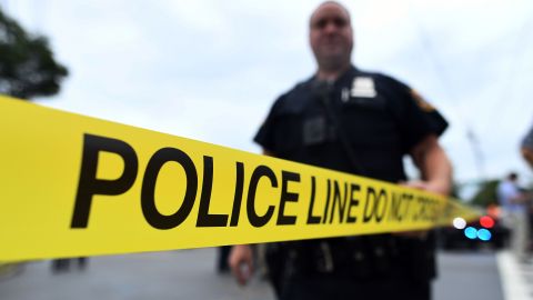 Law enforcement officers secure the area where they allegedly arrested terror suspect Ahmad Khan Rahami following a shootout in Linden, New Jersey, on September 19, 2016.16 - An "armed and dangerous" Afghan-born suspect wanted in the weekend bomb attacks in New York and New Jersey was wounded Monday in a shootout with police and taken into custody. Federal investigators released a mugshot of 28-year-old Ahmad Khan Rahami, who has brown hair, brown eyes and a brown beard, saying he was last known to live in Elizabeth, a town adjacent to Newark International Airport. (Photo by Jewel SAMAD / AFP) (Photo by JEWEL SAMAD/AFP via Getty Images)