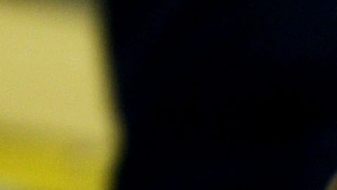 LONDON, ENGLAND - FEBRUARY 19: A cashier at a Travelex Bureau de Change counts U.S. Dollars in exchange for British pounds February 19, 2004 in London. The recent dramatic fall in the U.S.dollar has seen a rise in UK customers changing their pounds for the weaker greenback. (Photo by Ian Waldie/Getty Images) *** Local Caption ***