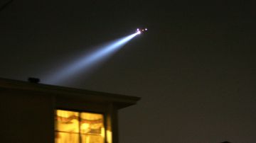 LOS ANGELES, CA - NOVEMBER 1: A police helicopter searches for a gunman in a road-rage incident on November 1, 2006 in the Koreatown section of Los Angeles, California. A series of high-profile murders, including the recent shooting deaths of three people in a restaurant, has many Koreatown residents afraid to go out after dark and local businessmen fearing a negative effect on South Korean investors and tourists. So far this year, Koreatown homicides have jumped 40 percent as rapes increased 47 percent and robberies 11percent. Koreatown has been growing its trendy section of luxury condominiums, fancy restaurants and nightclubs, and exclusive stores since it was hard-hit by the 1992 Los Angeles riots and gangs persist in Koreatown and the surrounding areas. (Photo by David McNew/Getty Images)