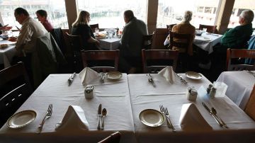 SAN FRANCISCO - DECEMBER 03: A table sits empty during the lunch hour at Alioto's Seafood Restaurant December 3, 2008 in San Francisco, California. A report by The Institute for Supply Management says that its services sector index dropped in November to 37.3, down from 44.4 in October, as the service industry struggles through the weak economy. (Photo by Justin Sullivan/Getty Images)