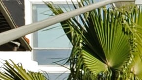 WEST HOLLYWOOD, CA - JANUARY 28: An excavator slows dowen the traffic in the construction zone of Sunset Boulevard, also known as "The Sunset Strip," where work has began on the $7 million facelift after more than 75 years of use on January 28, 2010 in West Hollywood, California. The City of West Hollywood received one million dollars in federal funds from the Federal American Reinvestment and Recovery Act for the Sunset Strip Beautification Project. (Photo by Kevork Djansezian/Getty Images)