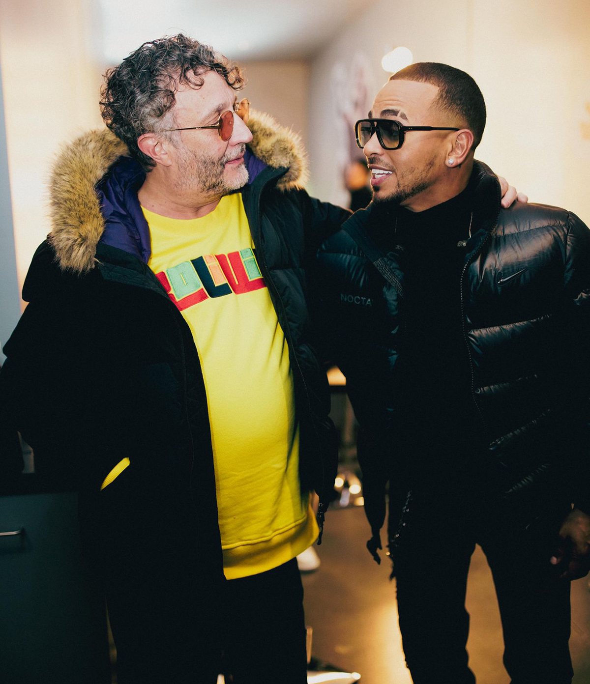 Fito Paez y Ozuna en la fiesta de la revista Rolling Stone