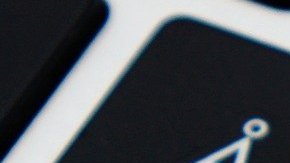 Foto del teclado de una computadora con una huella digital