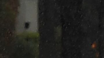 Cars drive through a flooded street after a storm dumped heavy rain on Los Angeles, California on February 2, 2019, - The city is enduring three back-to-back storms with heavy rain that is causing havoc in the normally dry climate of Southern California. (Photo by Mark RALSTON / AFP) (Photo credit should read MARK RALSTON/AFP via Getty Images)