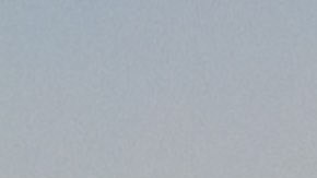 Vista aérea del centro de Los Ángeles con Dodger Stadium en primer plano.