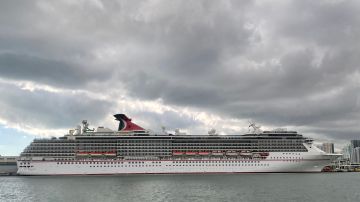 The cruise ship "Carnival Pride" part of the Carnival Cruise Line is seen moored at a quay in the port of Miami, Florida, on December 23, 2020, amid the Coronavirus pandemic. - (Photo by Daniel SLIM / AFP) (Photo by DANIEL SLIM/AFP via Getty Images)