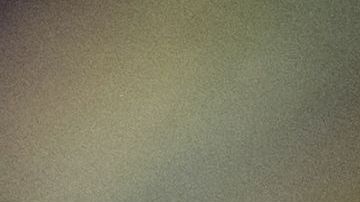 A photograph taken on December 17, 2021 shows a Christmas decoration depicting a Santa Claus with a protective facemask hanged on a Chrsitmas tree, in Paris. (Photo by JOEL SAGET / AFP) (Photo by JOEL SAGET/AFP via Getty Images)