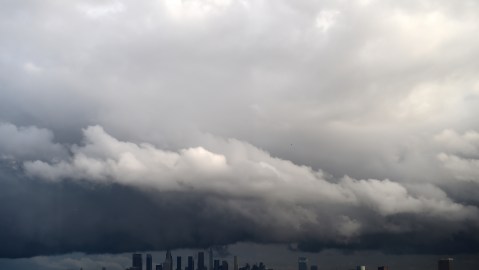Rain clouds move over downtown Los Angeles, California on January 12, 2017. A series of storms that have rolled across California in the past week dumping heavy rain and snow could herald the end of a punishing historic drought, officials said. / AFP / ROBYN BECK (Photo credit should read ROBYN BECK/AFP via Getty Images)