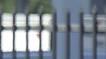 Police man an intersection May 11, 2018 following reports of shooting at Highland High School in Palmdale, 40 miles (65 kilometers) north of downtown Los Angeles. - Police arrested a man after reports of shootings at two schools near Los Angeles, the local sheriff's department and education officials said. The Los Angeles County Sheriff said one suspect had been detained "regarding the person with a gun" at Highland High School. Local news reports had earlier said that at least one person had been wounded. It was not immediately clear what type of weapon the man had. (Photo by Frederic J. BROWN / AFP) (Photo credit should read FREDERIC J. BROWN/AFP via Getty Images)