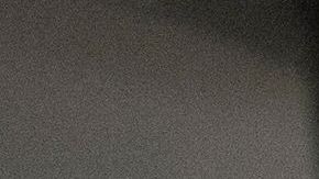 Travelers check for flight information at Los Angeles International Airport in Los Angeles, California, on December 24, 2021. - Over 2,000 flights have been cancelled and thousands delayed around the world as the highly infectious Omicron variant disrupts holiday travel. According to tracking website Flightaware.com at 1540 GMT on Friday, a total of 2,118 flights had been cancelled worldwide, including 500 flights originating from or headed to US airports, and over 5,700 delayed. (Photo by DAVID MCNEW / AFP) (Photo by DAVID MCNEW/AFP via Getty Images)