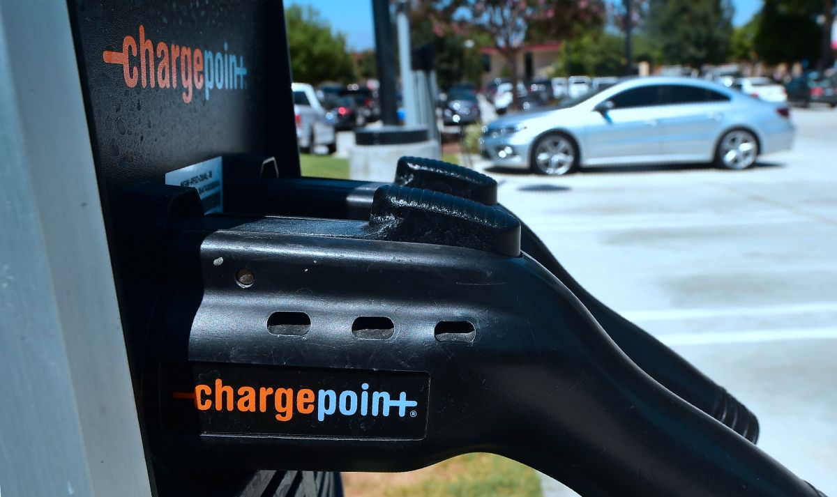 A non-electric vehicle fills a parking spot at a lot in Rosemead, California, where two Electric Vehicle charging stations are offered on September 12, 2018. - California Governor Jerry Brown signed a bill on September 10 pledging 100 percent clean electricity by 2045. (Photo by Frederic J. BROWN / AFP) (Photo credit should read FREDERIC J. BROWN/AFP via Getty Images)