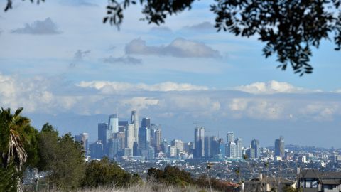 The downtown Los Angeles skyline is seen on New Year's Eve, December 31, 2021. (Photo by Chris DELMAS / AFP) (Photo by CHRIS DELMAS/AFP via Getty Images)