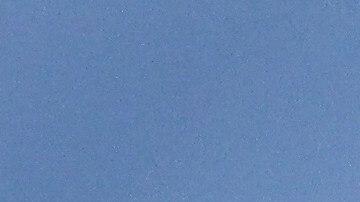 A police helicopter is pictured in the sky as it flies over the compound of the University of Heidelberg, southwestern Germany, after an attack by a lone perpetrator on January 24, 2022. - A gunman injured several people in a shooting inside a lecture hall at Heidelberg University, police said, adding that the perpetrator was now dead. (Photo by Daniel ROLAND / AFP) (Photo by DANIEL ROLAND/AFP via Getty Images)