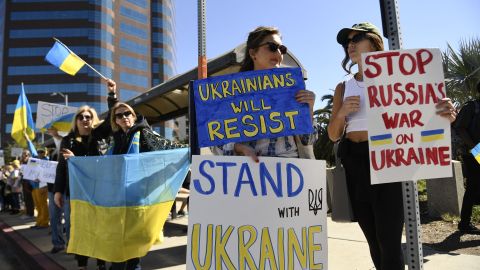 Demonstrators protest in support of Ukraine, in Los Angeles, on February 24, 2022. - Russian President Vladimir Putin launched a full-scale invasion of Ukraine on Thursday, unleashing air strikes and ordering ground troops across the border in fighting that Ukrainian authorities said left dozens of people dead. (Photo by Patrick T. FALLON / AFP) (Photo by PATRICK T. FALLON/AFP via Getty Images)