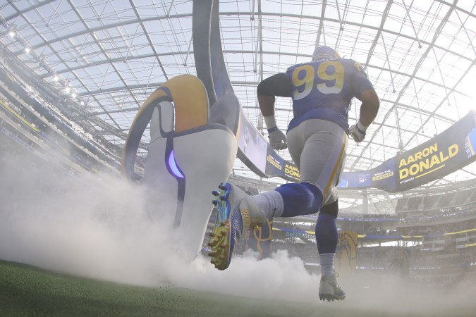 INGLEWOOD, CALIFORNIA - DECEMBER 05: Aaron Donald #99 of the Los Angeles Rams runs on the field during players introduction prior to the game against the Jacksonville Jaguars at SoFi Stadium on December 05, 2021 in Inglewood, California. (Photo by Harry How/Getty Images)