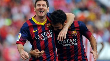Lionel Messi y Cesc Fábregas.