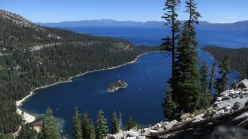 SOUTH LAKE TAHOE, CA - JULY 23: Emerald Bay lies under blue skies at Lake Tahoe on July 23, 2014 near South Lake Tahoe, California. Lake Tahoe is among Califonria's major tourist attractions. (Photo by Sean Gallup/Getty Images)