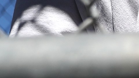 SAN QUENTIN, CA - AUGUST 15: A condemned inmate stands with handcuffs on as he preapres to be released from the exercise yard back to his cell at San Quentin State Prison's death row on August 15, 2016 in San Quentin, California. San Quentin State Prison opened in 1852 and is California's oldest penitentiary. The facility houses the state's only death row for men that currently has 700 condemned inmates. (Photo by Justin Sullivan/Getty Images)