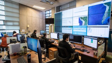 Technicians of the National Seismological Center (CSN) of the University of Chile, organization in charge of monitoring the seismic activity in the Chilean territory, work in Santiago, August 4, 2017. Chile has put the San Ramon geological fault capable of destroying the eastern zone of Santiago- under vigilance to try to figure out how this potentially elevated seismic source behaves. / AFP PHOTO / Christian Miranda / TO GO WITH AFP STORY BY GIOVANNA FLEITAS (Photo credit should read CHRISTIAN MIRANDA/AFP via Getty Images)