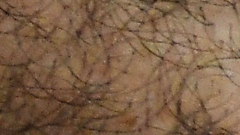 Detail of the hands of former Salvadoran President (2004-2009) Elias Antonio Saca with handcuffs, taken as he waits, along with six of his collaborators, for the judge to arrive in court in San Salvador on May 16, 2018, to face charges of embezzlement and laundering for allegedly diverting 298 million dollars. - Saca was arrested in October 2016 with his former private secretary and former communications secretary, among others, suspected of pocketing $246 million in public funds during his 2004-2009 mandate. They have been charged with embezzlement, criminal association and money laundering. (Photo by Marvin RECINOS / AFP) (Photo credit should read MARVIN RECINOS/AFP via Getty Images)