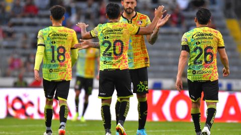 Los jugadores de Atlas celebran el segundo gol que les dio el triunfo.