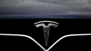CORTE MADERA, CALIFORNIA - MAY 20: The Tesla logo is displayed on the front of a Tesla car on May 20, 2019 in Corte Madera, California. Stock for electric car maker Tesla fell to a 2-1/2 year low after Wall Street analysts questioned the company's growth prospects. (Photo by Justin Sullivan/Getty Images)