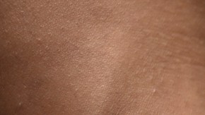 A member of "Mara 18" gang stands handcuffed during an inspection at Centro Preventivo de Hombres prison, after the release of three guards of the penitentiary system (SP) in Guatemala City on September 4, 2020. - Guatemalan gang members on Friday released three prison guards who had been taken hostage in a jail in the capital, in rejection of the transfer of criminal gang leaders to other prisons, the government said. (Photo by Johan ORDONEZ / AFP) (Photo by JOHAN ORDONEZ/AFP via Getty Images)