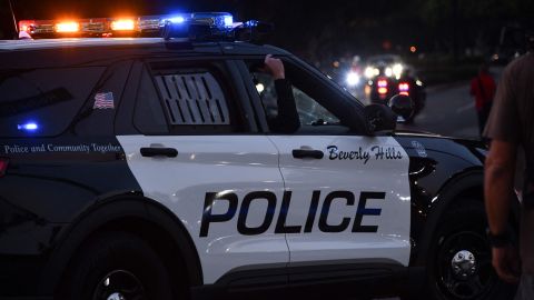 Beverly Hills police officers patrol in their car on November 1, 2020 in Beverly Hills. (Photo by Chris DELMAS / AFP) (Photo by CHRIS DELMAS/AFP via Getty Images)