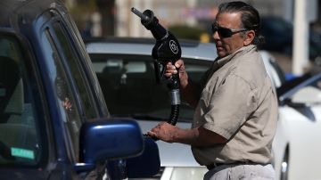 MILL VALLEY, CA - MARCH 03: A customer prepares to pump gasoline into his car at an Arco gas station on March 3, 2015 in Mill Valley, California. U.S. gas prices have surged an average of 39 cents in the past 35 days as a result of the price of crude oil prices increases, scheduled seasonal refinery maintenance beginning and a labor dispute at a Tesoro refinery. It is predicted that the price of gas will continue to rise through March. (Photo by Justin Sullivan/Getty Images)