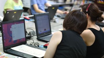 This picture taken on July 24, 2015 shows women receiving a personal computer operation training at a rehabilitation facility to support reintegration for former prisoners in Tokyo. For Japan's increasing cohort of elderly prison inmates, the prospect of a life of freedom upon release is fraught with unease. / AFP / KAZUHIRO NOGI / TO GO WITH AFP STORY: "JAPAN-CRIME-ELDERLY", Feature by Natsuko FUKU (Photo credit should read KAZUHIRO NOGI/AFP via Getty Images)