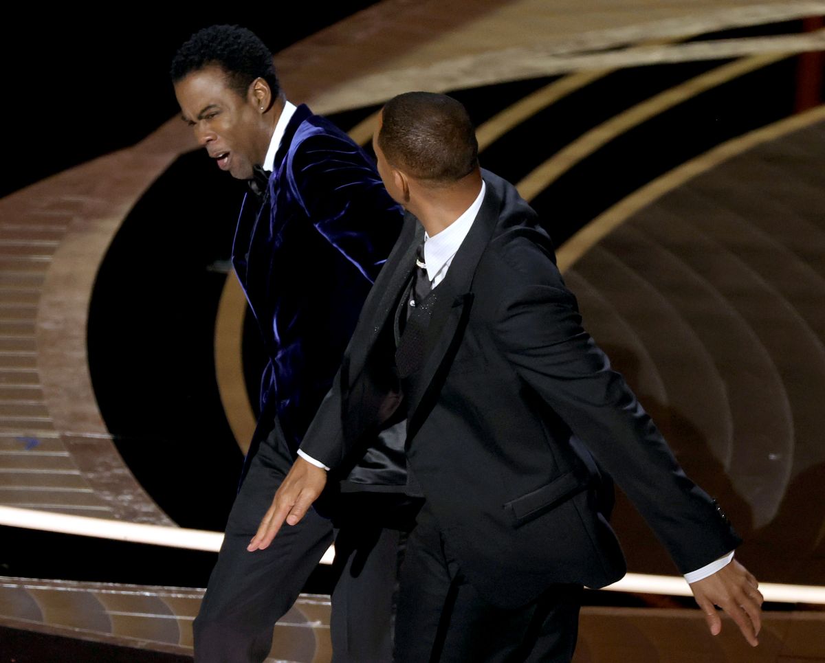 Will Smith punches Chris Rock during the 2022 Oscars broadcast.