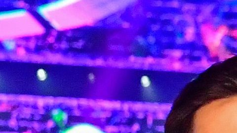 Eduin Caz e integrantes de Grupo Firme.