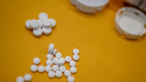 This illustration image shows tablets of opioid painkiller Oxycodon delivered on medical prescription taken on September 18, 2019 in Washington,DC. - Millions of Americans sank into addiction after using potent opioid painkillers that the companies churned out and doctors freely prescribed over the past two decades. Well over 400,000 people died of opioid overdoses in that period, while the companies involved raked in billions of dollars in profits. And while the flood of prescription opioids into the black market has now been curtailed, addicts are turning to heroin and highly potent fentanyl to compensate, where the risk of overdose and death is even higher. (Photo by Eric BARADAT / AFP) (Photo by ERIC BARADAT/AFP via Getty Images)