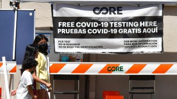 People arrive at a Covid testing site in Los Angeles, California on April 15, 2022. - A new study shows the spread of Covid-19 in Los Angeles County is more widespread than testing has shown and among children, the numbers suggest five times more children were actually infected than testing confirmed. (Photo by Frederic J. BROWN / AFP) (Photo by FREDERIC J. BROWN/AFP via Getty Images)