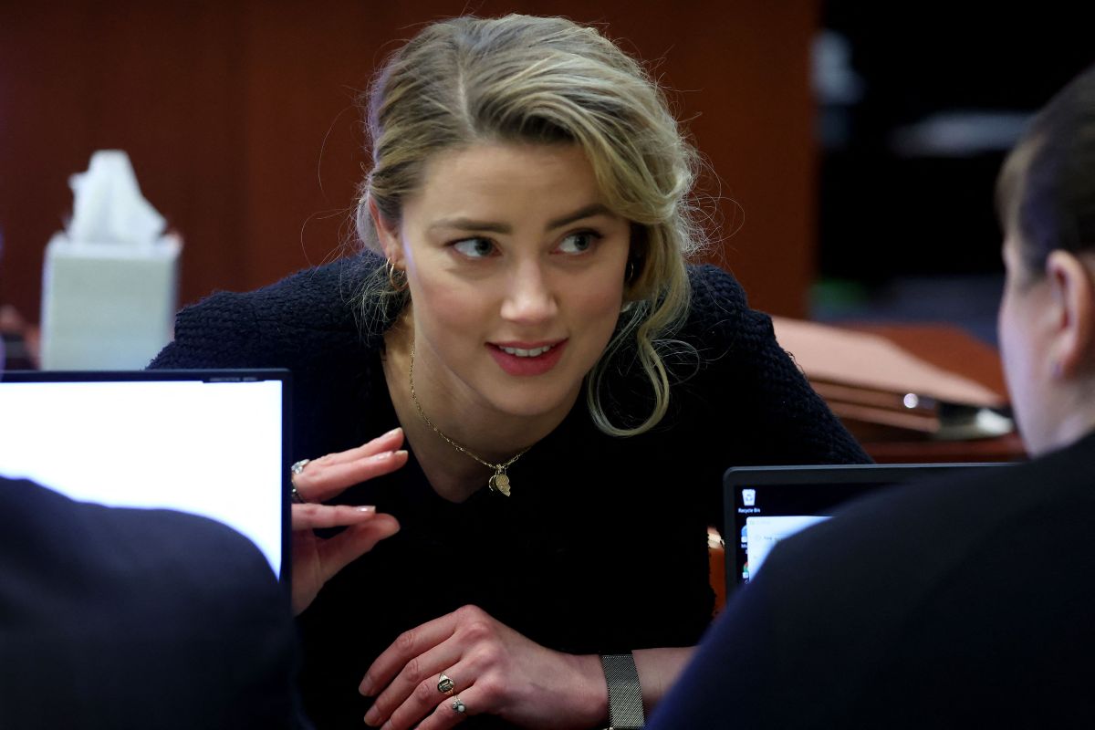 Amber Heard speaking with her defense at her libel trial in a lawsuit by her ex-husband Johnny Depp.
