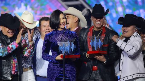 Ángela Aguilar y Grupo Firme | Manuel Velasquez/Getty Images for Estrella Media.