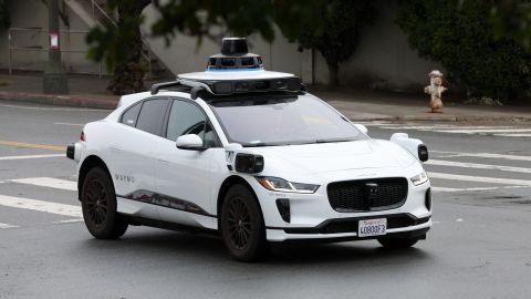 SAN FRANCISCO, CALIFORNIA - APRIL 11: A Waymo autonomous vehicle drives along Masonic Avenue on April 11, 2022 in San Francisco, California. San Francisco is serving as testing grounds for autonomous vehicles with Waymo, a Google subsidiary and Cruise, a subsidiary of General Motors, logging millions of test miles throughout San Francisco in 2021. (Photo by Justin Sullivan/Getty Images)