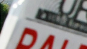 BEVERLY HILLS, CA - DECEMBER 16: Thousands of strikers and supporters rally at a Pavilions supermarket December 16, 2003 in Beverly Hills, California. Locked-out and striking supermarket workers and their supporters held the largest march and rally since the strike began, walking from Century City to the Beverly Hills store to call for a nationwide strike. Seventy-thousand supermarket workers from 860 southern California Ralphs, Vons, Albertsons, and Pavilions stores have been on strike or locked out of their jobs since October 11. (Photo by David McNew/Getty Images)