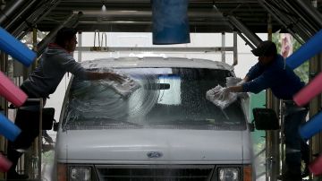 SAN FRANCISCO, CA - JANUARY 29: Workers wash a van at a car wash on January 29, 2014 in San Francisco, California. California. Gov. Jerry Brown declared a drought state of emergency for California as the state faces water shortfalls in what is expected to be the driest year in state history. Residents are being asked to voluntarily reduce water usage by 20%. Some counties are imposing mandatory reductions and banning the watering of lawns. (Photo by Justin Sullivan/Getty Images)