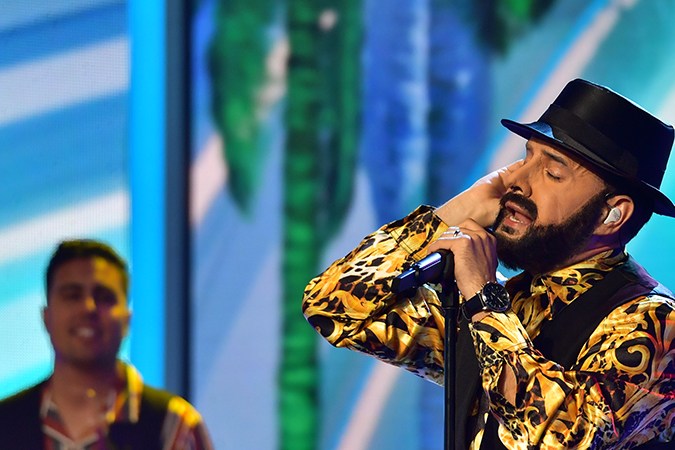 Manny Cruz como Juan Luis Guerra