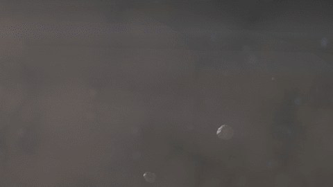 Imagen conceptual de meteoritos entregando nucleobases a la Tierra antigua.