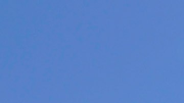 LOS ANGELES, CA - JULY 17: California Highway Patrol officers lead motorist before they pass under the Mulholland Bridge on the Interstate 405 after it re-opened ahead of schedule following a 10-mile shutdown of the freeway for bridge work on July 17, 2011 in Los Angeles, California. Los Angeles city officials advised residents to stay home or stay away from the area over the weekend fearing massive traffic jams of what has become known as "Carmageddon." which never materialized. (Photo by Kevork Djansezian/Getty Images)