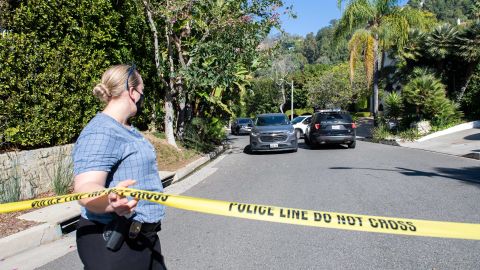 A Yellow Police tape blocks access to the 1100 block of Maytor place where Jacqueline Avant's house is at the top of the hill, in Beverly Hills , California on December 1, 2021. - The wife of the man known as the "Godfather of Black Music" was shot and killed Wednesday in a break-in at the couple's Beverly Hills home, US media reported. Jacqueline Avant died after being shot by a burglar, who also opened fire on a security guard, according to tabloid website TMZ. (Photo by VALERIE MACON / AFP) (Photo by VALERIE MACON/AFP via Getty Images)