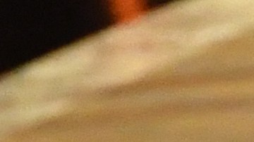 Chris Rock en el escenario de los Óscars 2022.