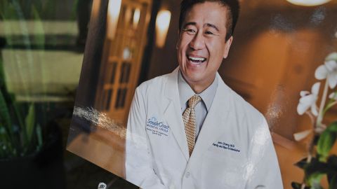 A photo of Dr. John Cheng is seen outside his office in Aliso Viejo, California, May 16, 2022. - Cheng, 52, a family and sports medicine doctor was killed protecting others when a gunman opened fire at church services he was attending in nearby Laguna Woods, California on May 15, 2022. Cheng charged the gunman in a bid to bring him to the ground, allowing others to hogtie him, but was fatally hit by the gunfire. (Photo by Robyn Beck / AFP) (Photo by ROBYN BECK/AFP via Getty Images)