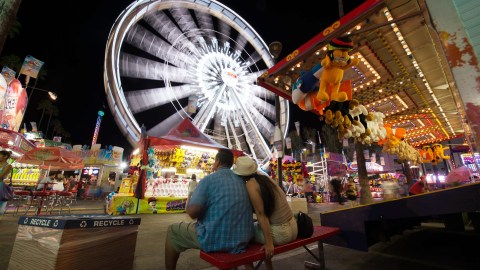 Visitors attend the Los Angeles County Fair 2013 in Pomona, California on September 4, 2013. The LA County Fair kicked off on August 30 and will run through September 29. AFP PHOTO /JOE KLAMAR (Photo credit should read JOE KLAMAR/AFP via Getty Images)