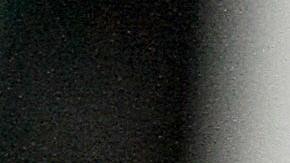 -- TO GO WITH AFP STORY IN SPANISH BY ALEXANDER MARTINEZ -- A handgun is seen on a police officer desk near two handcuffed 15-year old Venezuelan teenagers with their faces covered at a police station after being arrested for assault with a deadly weapon in the district of Sucre, Caracas on March 27, 2009. Crime, violence and insecurity are major issues in Venezuela, considered by NGO Venezuelan Violence Observatory to be the second most violent nation in Latin America - behind Colombia - after having registered 14,000 murders in 2008. AFP PHOTO/Thomas Coex (Photo credit should read THOMAS COEX/AFP via Getty Images)