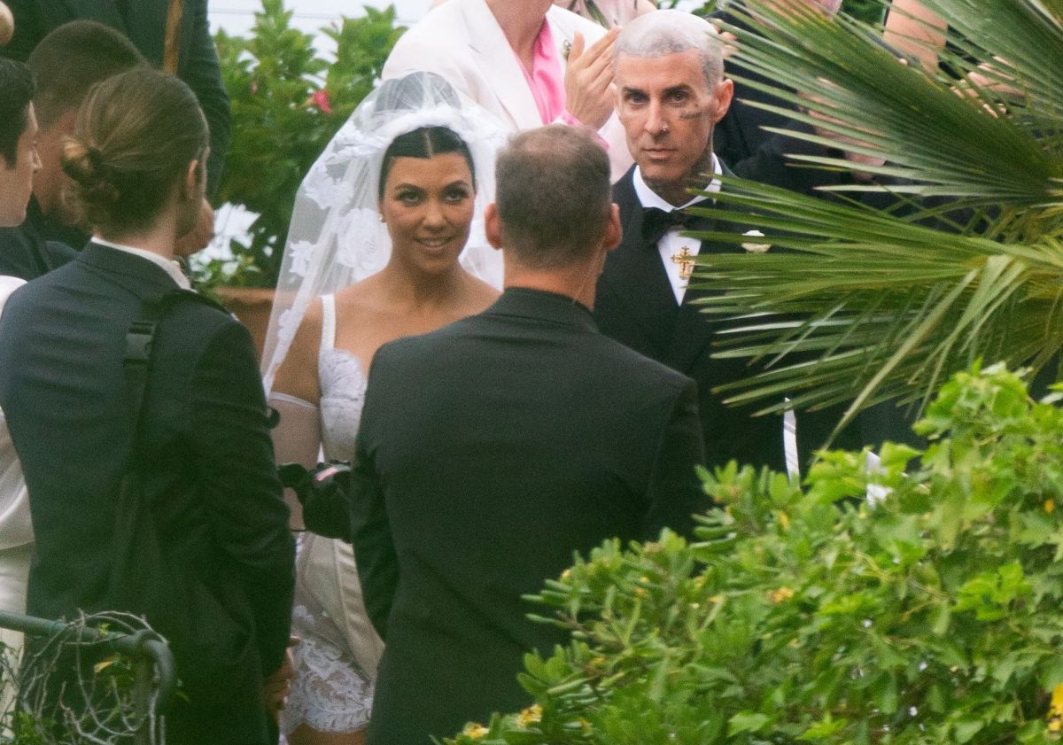 Kourtney Kardashian and Travis Baker had a particular wedding in Italy and fans compared them to "Los Locos Adams"